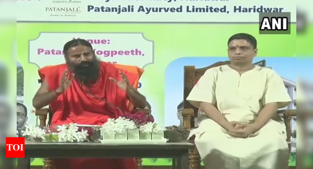 Coronil Patanjali Medicine: Patanjali launches Ayurvedic Covid-19 medicine, claims 100% recovery | India Business News - Times of India