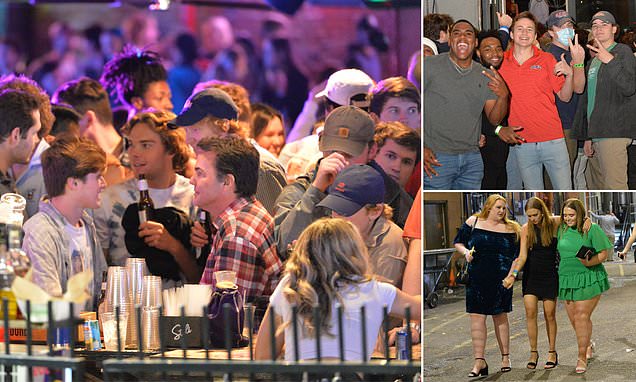 Maskless revelers take to the streets in Mississippi after mask mandate is lifted | Daily Mail Online